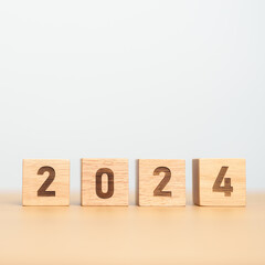 2024 year block on table. goal, Resolution, strategy, plan, start, budget, mission, action, motivation and New Year concepts