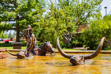 Sunny exterior view of the fountain of Oklahoma City Community College