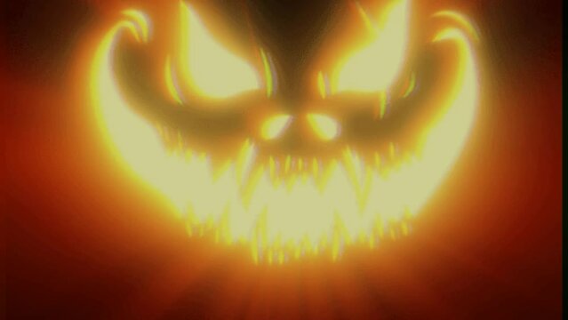 Scarry looking Halloween pumpkin spooky face on the dark background for horror video 4k