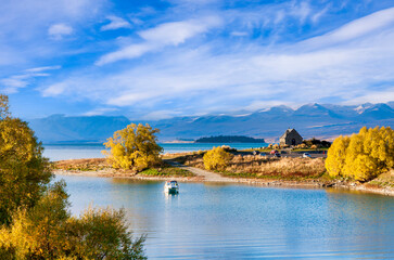 Church of the Good Shepherd on the shores of Lake Tekapo, Canterbury, New Zealand. This little church is on the tourist trail, and is an icon of New Zealand tourism. - obrazy, fototapety, plakaty