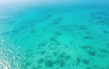 Crystal Clear Turquoise Water with Sunlight Reflections