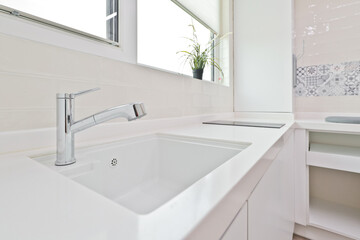 Install a sink bowl in the laundry room and use it for various purposes