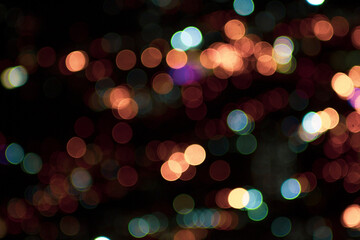 Photo of bokeh lights on black background © alexander