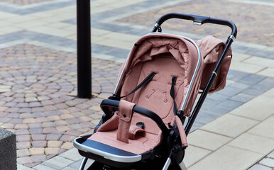 empty baby stroller near the open entrance to the store.