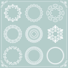 Vintage set of round elements. White elements for design frames, cards, menus, backgrounds and monograms. Classic patterns. Set of vintage patterns