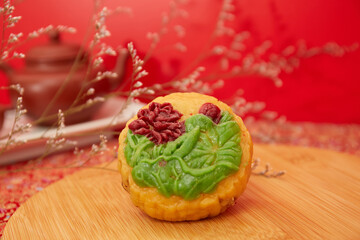 Mooncake, Moon cake for Mid-Autumn Festival, concept of traditional festive food on table with tea , close up, copy space