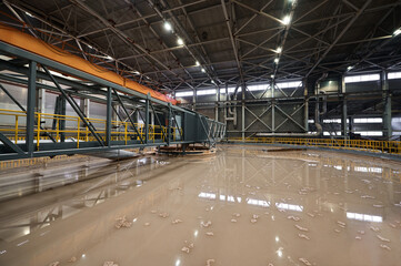 Brown liquid material in contemporary gravity thickener