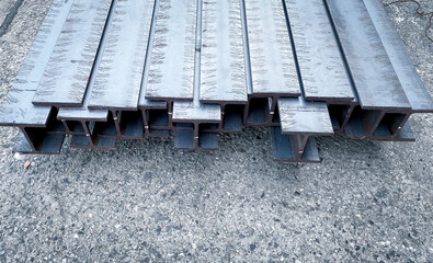 Metal profile beam in packs at the warehouse of metal products.Metal profile beam in packs at the warehouse of metal products.Thailand