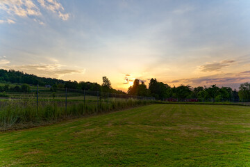 Scenic view of landscape with colorful cloudy spring evening sky at Swiss City of Zürich district Schwamendingen. Photo taken June 3rd 2023, Zurich, Switzerland.