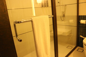 Elegant bathroom with towels and mirror