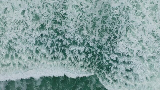 Aerial Shot of Ocean Waves Crashing from Above
