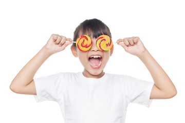 Young Asian girl smiles and holding lollipop candy isolated on white background with clipping path.
