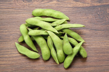 Edamame, fresh green soybeans, food preparation
