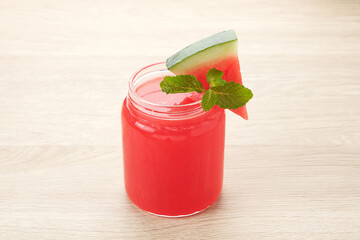 Fresh watermelon juice with mint leaf, cold pressed juice. 

