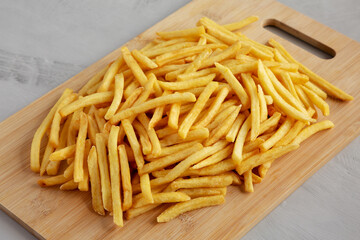 Homemade French Fries on a Plate, side view.