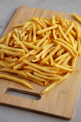 Homemade French Fries on a Plate, side view.