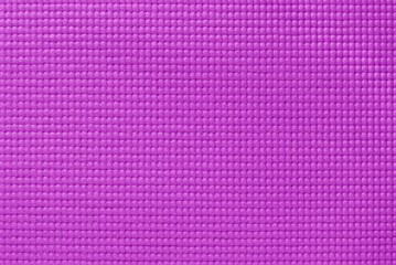 Purple yoga mat texture, pattern of rubber for background.