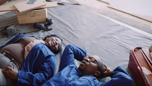 Close Up of Black Couple Lying Down on the Floor