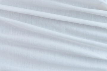 Obraz premium White wavy pattern calico fabric background 
