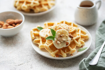 Belgian waffles with fruit, bananas and honey. Homemade baking.