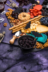 Halloween cheeseboard with blue and red cheese