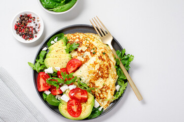 Omelette Served with Avocado and Cherry Tomatoes, Healthy Breakfast