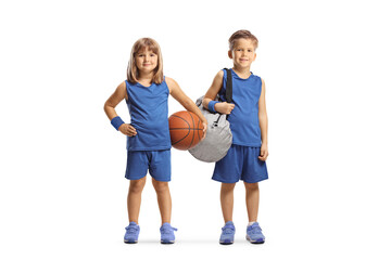 Obraz na płótnie Canvas Full length portrait of a girl and boy with a basketball and a sports bag