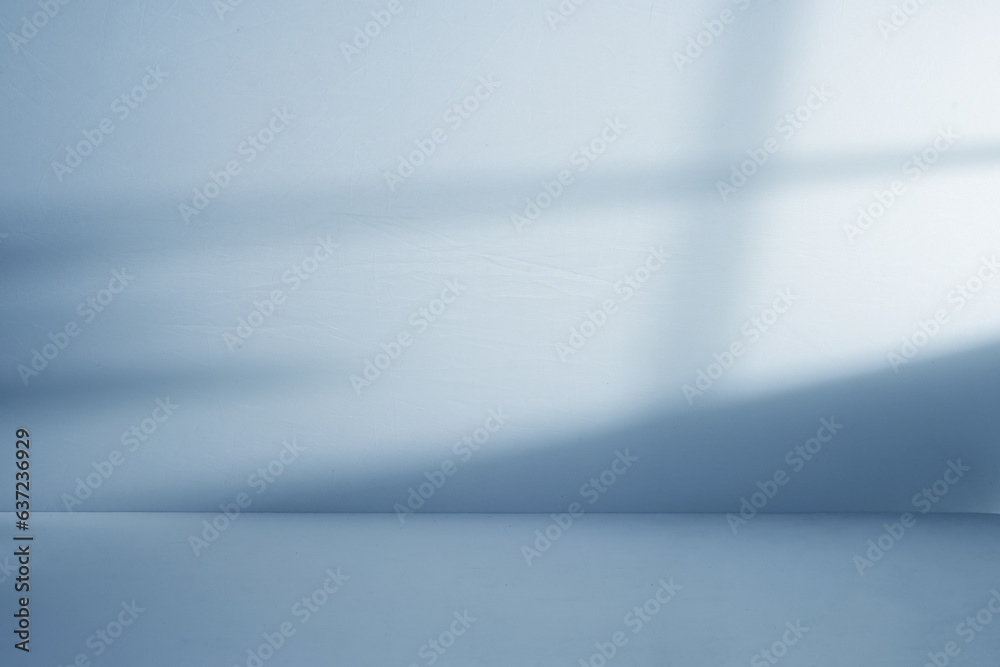 Poster blue studio space with window shadow