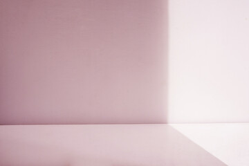 Pink empty wall with shadow overlay