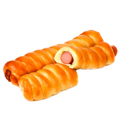 Sausages in the dough on a white background