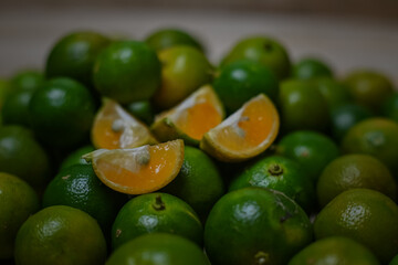 Calamansi oranges on wooden background