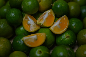 Calamansi oranges on wooden background
