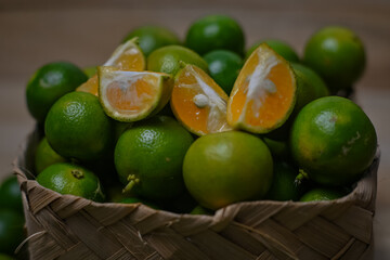 Calamansi oranges on wooden background