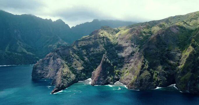 Drone View of Cloud Cover Changing Light on Lush Island Ridges on Fatu Hiva Island in the Marquesas Islands South Pacific French Polynesia