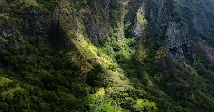 Sunlight Moving Across Lush Green Mountain and Tropical Rainforest as the Clouds Change Overhead on Fatu Hiva Island Marquesas South Pacific French Polynesia