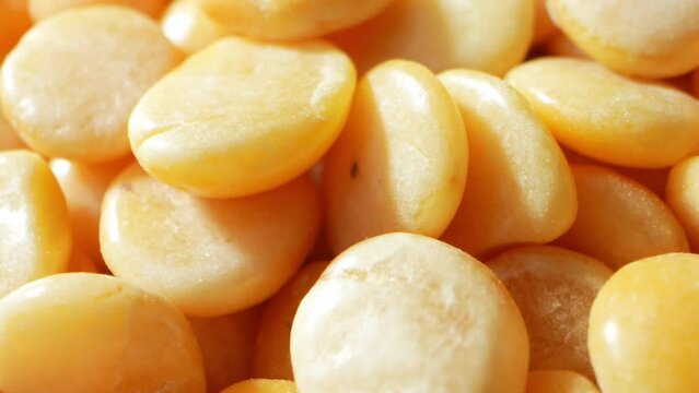 Split Pigeon Peas (Toor Dal): Nutrient-rich legume, split and hulled for easy cooking. High in protein, fiber, and essential vitamins. A staple in Indian cuisine.
