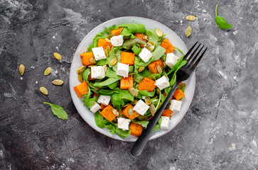 Pumpkin Salad with Arugula, Feta Cheese, and Pumpkin Seeds, Salad Mix with Roasted Pumpkin, Autumn Salad