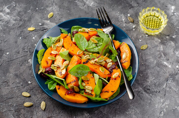 Grilled Pumpkin Salad with Arugula, Spinach, and Pumpkin Seeds, Salad Mix with Roasted Pumpkin, Autumn Salad