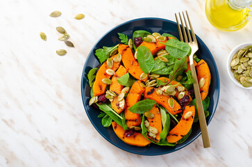 Grilled Pumpkin Salad with Arugula, Spinach, and Pumpkin Seeds, Salad Mix with Roasted Pumpkin, Autumn Salad