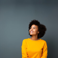 Fototapeta premium Portrait of a young African American woman with a studio background. Generative AI.