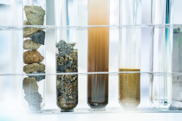 Rock sample in geology science laboratory research, mineral soil test in chemistry lab industry...