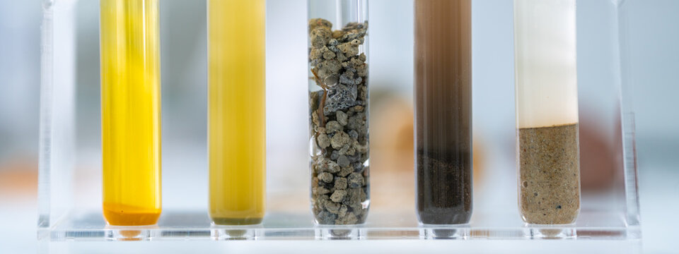 Rock sample in geology science laboratory research, mineral soil test in chemistry lab industry analysis work, geological stone material from nature with scientific equipment for industrial business