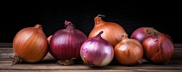Onions on wooden board. Fresh onion against old wood table.  copy space for text - obrazy, fototapety, plakaty