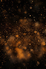 Fototapeta na wymiar Golden dust particles on a black background
