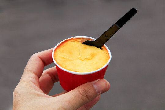 Cheese Cream Cup with Cake  Hand Holding a Famous Dessert Product in Yufuin, Japan