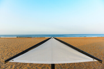Sunbeds, Beach loungers, Relaxation, Beachside, Umbrellas,
