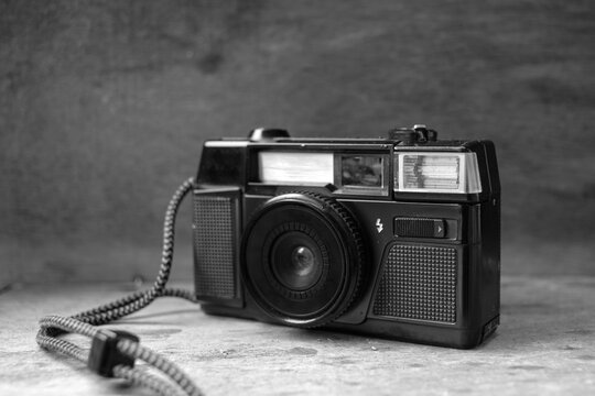old photo camera and simple classic analog pocket camera photoshoot