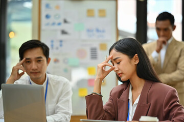 Stressed employees searching problem solution at meeting or dissatisfied with work results.