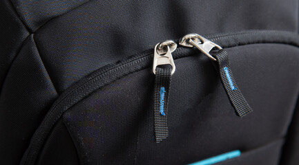 Zipper on sports backpack. Closeup