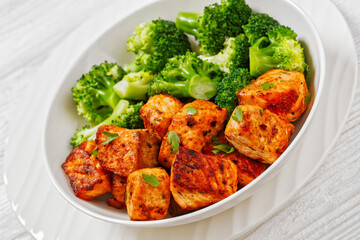 fried salmon bites with steamed broccoli florets